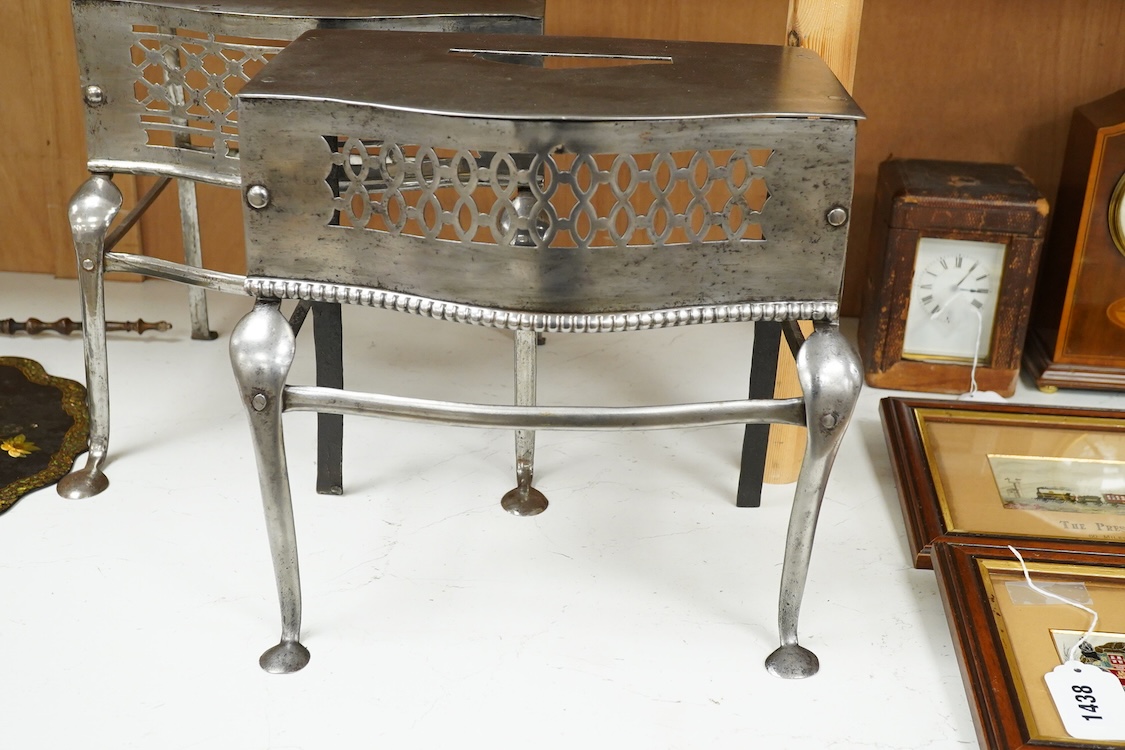 Two late Georgian pierced steel footman, 29cm high